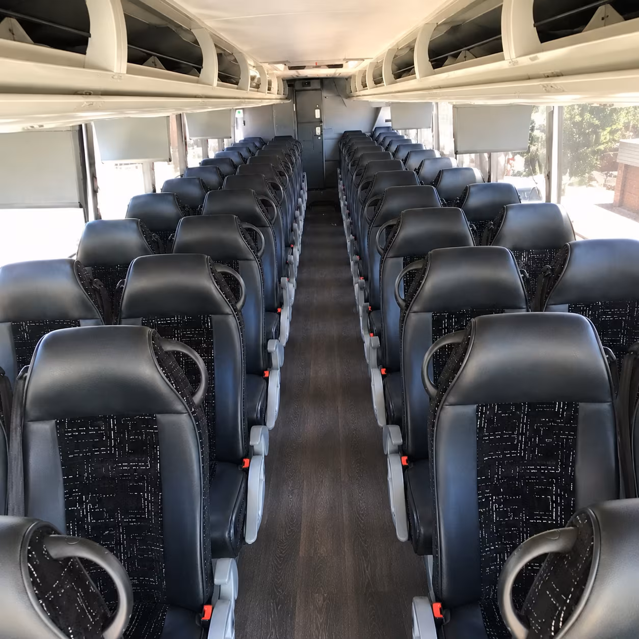 charter bus minibus transfers at bill and hillary clinton national airport lit